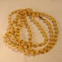 54 Inch plastic bead rope necklace with clasp marbled cream vintage ll2921