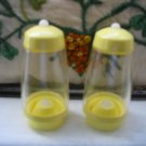 Yellow And Clear Salt And Pepper Shakers