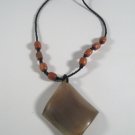 16" Hand carved wood bead necklace with pendant.