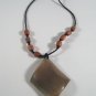 16" Hand carved wood bead necklace with pendant.
