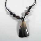 Black seed teardrop pendant with beads