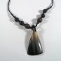 Black seed teardrop pendant with beads