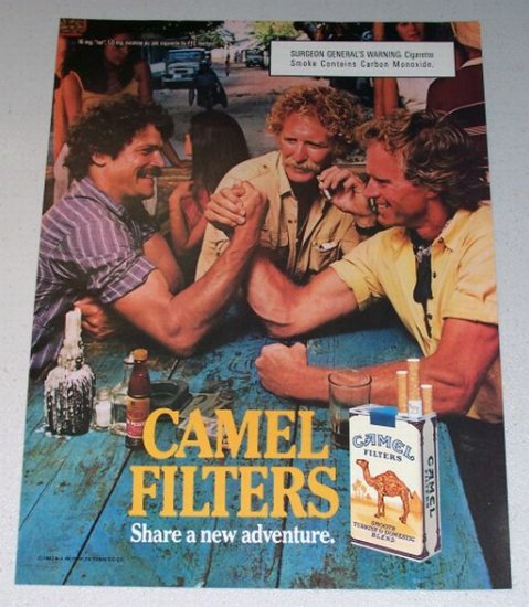 1987 Camel Cigarettes Arm Wrestling Color Print Ad with Carbon Monoxide Warning