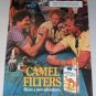 1987 Camel Cigarettes Arm Wrestling Color Print Ad with Carbon Monoxide Warning