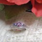 0.50ctw Oval & Pear Shape Tanzanite With .14ctw Round White Zircon .925 SS Sz 8