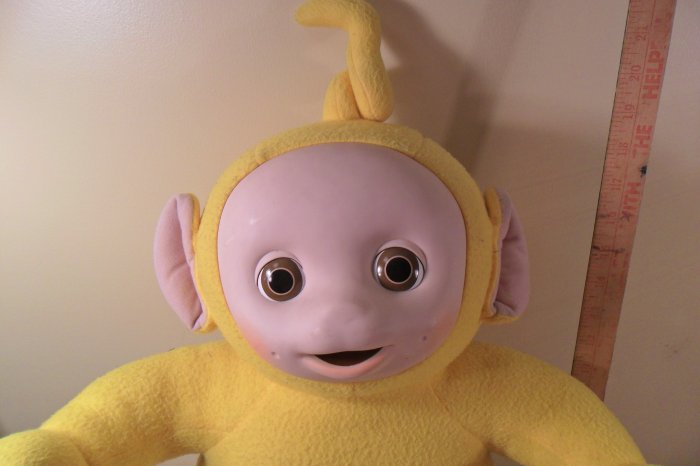 yellow teletubby doll