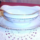 Noritake Wellesley gravy boat with attached plate and gold trim