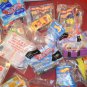 Medium priority box filled with Hot Wheels happy meal toys un-open 1990's