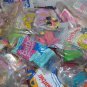 Large priority box filled with Barbie happy meal toys