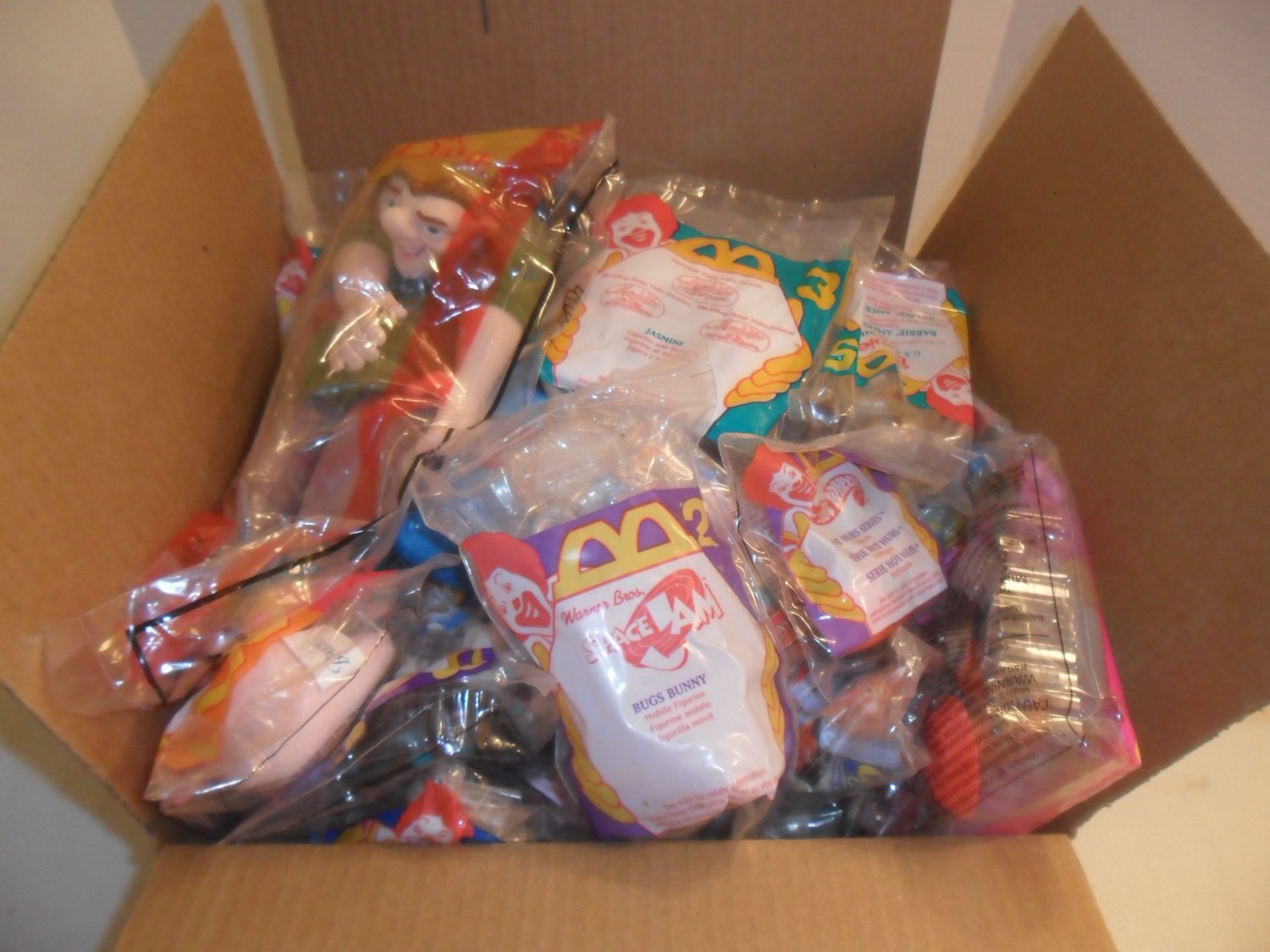 Large Box filled with collectible McDonald's and Burger King Happy Meal