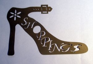 Die cut black shoe for shopping