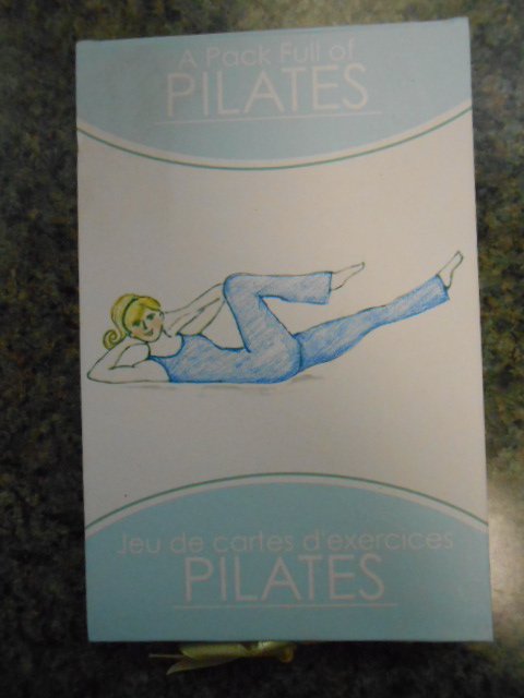 A Pack Full of Pilates Instruction Cards and Resistance Band Set!