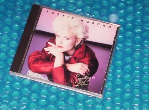 Lorrie Morgan  Something in Red       755174592027    (820)
