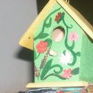 green/yellow flora birdhouse