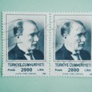 2 Turkish Postage Stamps with the first President Mustafa Kemal Ataturk on it in green tones