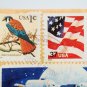 Partial Envelope with eleven United States Postage Stamps and Ink Postmark on it