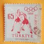 Turkish Postage Stamp honoring the 7 medals won by Turkish wrestlers in 1956 Melbourne Olympics