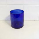 A hand blown cobalt blue glass.