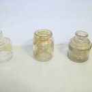 3 inkwells one is marked Waterman's