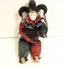 Sad clown music box doll