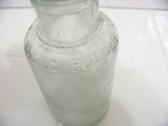 Embossed Davis OK baking powder bottle