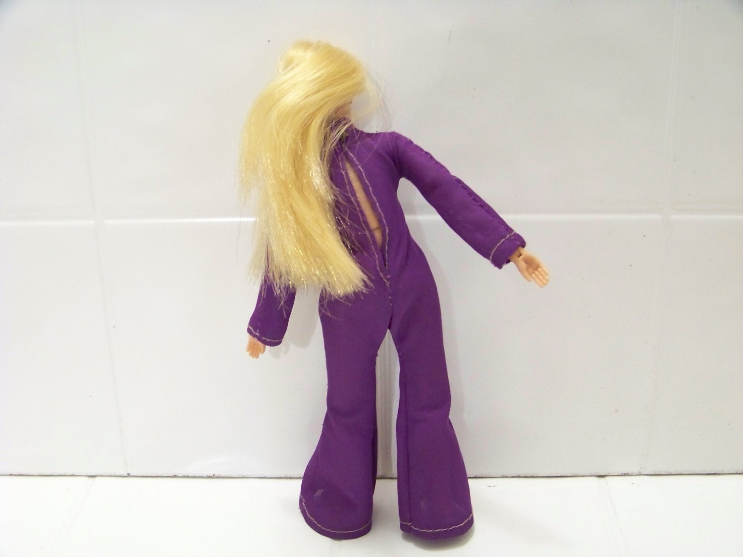 Vintage Dinah Mite doll action figure toy in purple jump suit Mego 1972