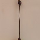 Green/black/yellow/red feather bead clip (3)
