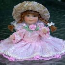 Porcelain Doll  Braids and Pink dress
