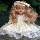 Smarll Doll  with Goldilock Curls"