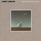 alone but never alone / mca 5689 larry carlton