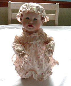 praying porcelain doll