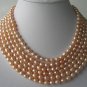 Genuine 116 Inch Lustrous Pink Pearl Necklace