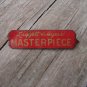 LIGGETT MYERS MASTERPIECE TIN ADVERTISING TOBACCO TAG,