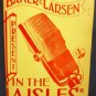 In the Aisles by Baker & Larsen Singed by both