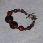 burgandy and black bracelet handcrafted one of a kind