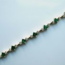 Gold Bracelet with Emeralds and Diamonds