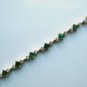 Gold Bracelet with Emeralds and Diamonds