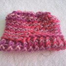 Hand-knitted doll hat, pink