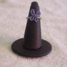 Butterfly ring, purple on green