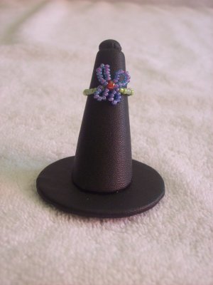 Butterfly ring, purple on green