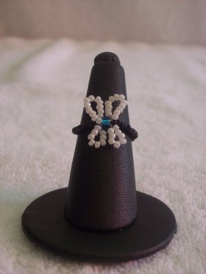 Butterfly ring, white on black