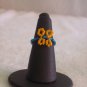 Butterfly ring, orange on blue