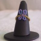 Butterfly ring, purple on gold