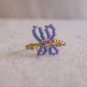 Butterfly ring, purple on gold