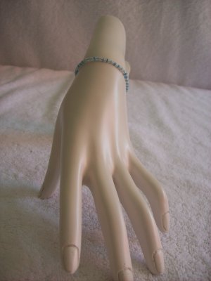 Beaded bracelet, clear and light blue