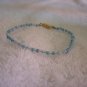 Beaded bracelet, clear and light blue