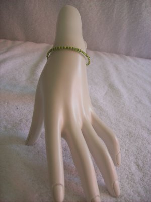 Beaded bracelet, green and yellow