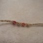 Wish bracelet (on tan) - red, tan, orange, tan