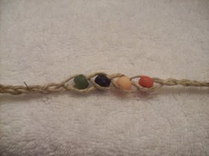 Wish bracelet (on tan, in vintage colors) - red, yellow, navy, green