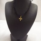 Gold cross on black square/open square